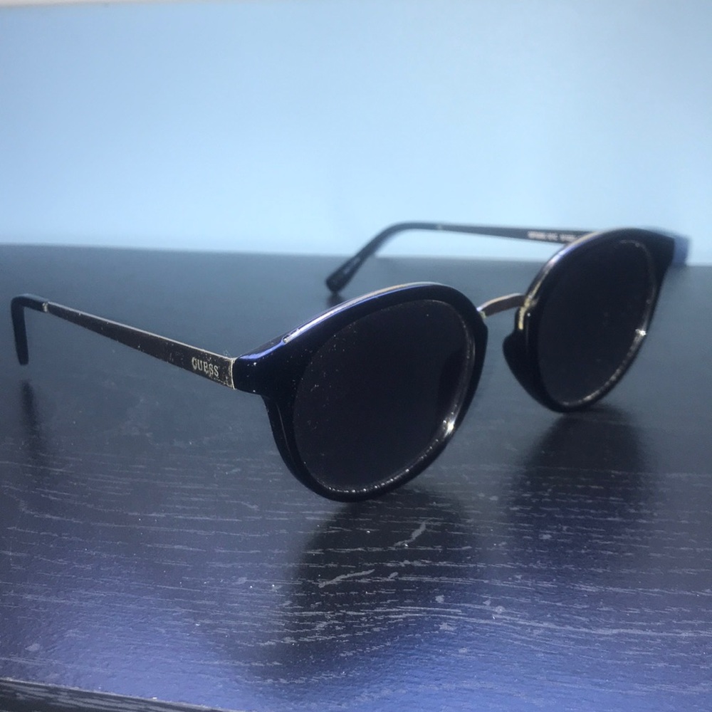 Black and gold guess sunglasses